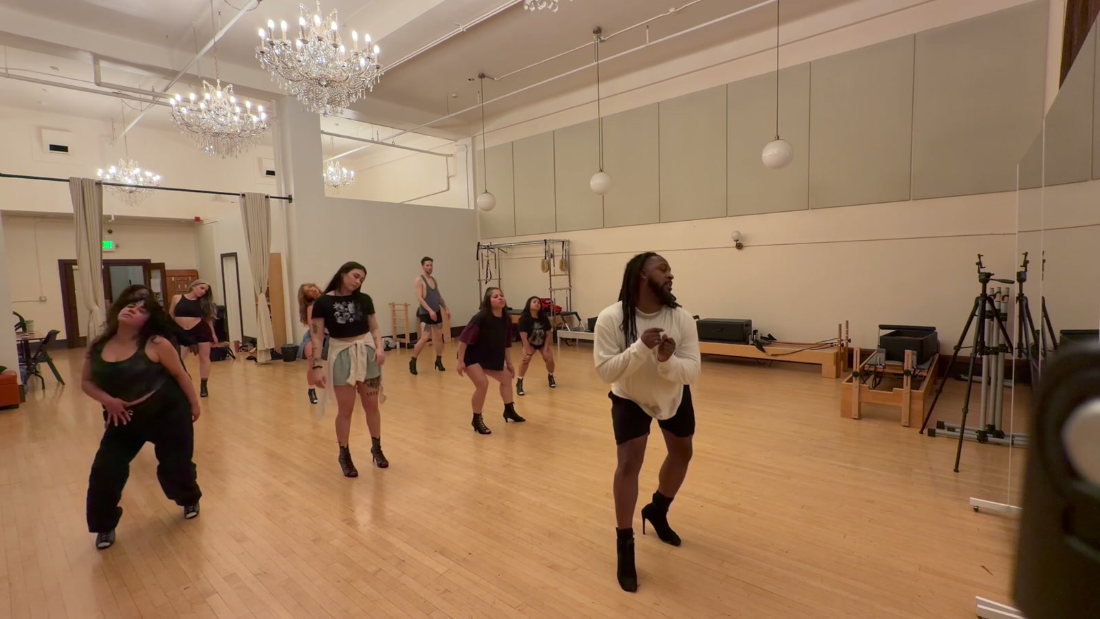 Zay's BAEs performing a choreographed routine together in the studio